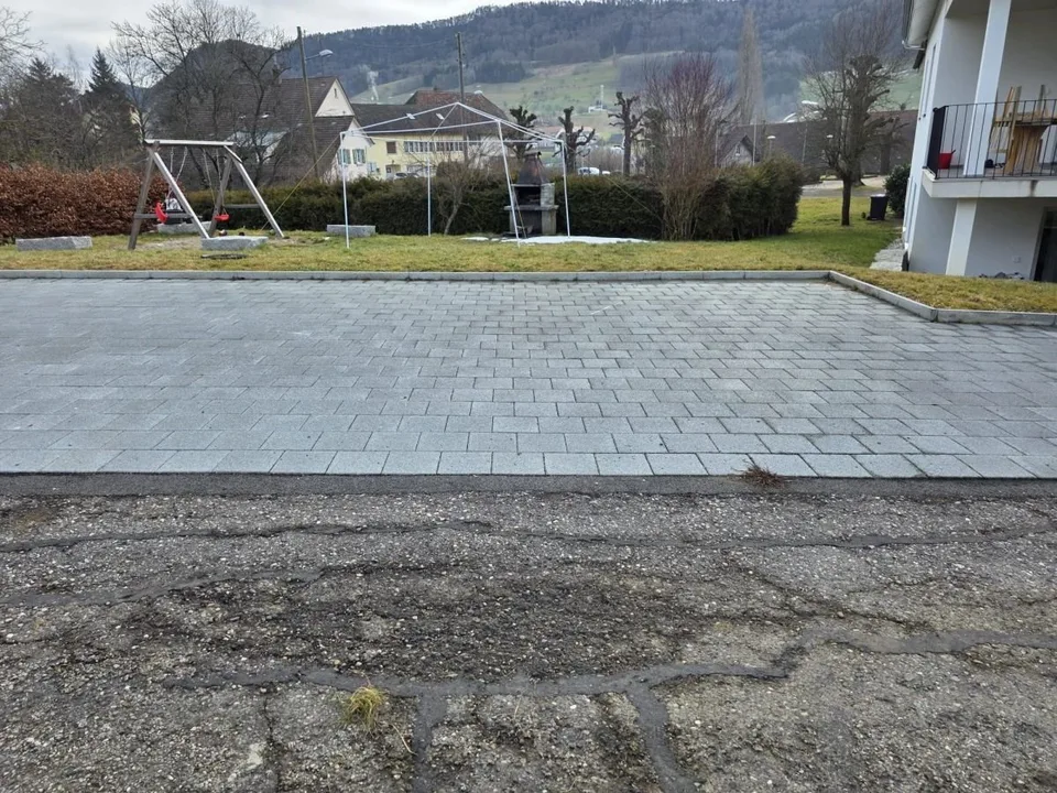 6 outdoor parking spaces, new and even