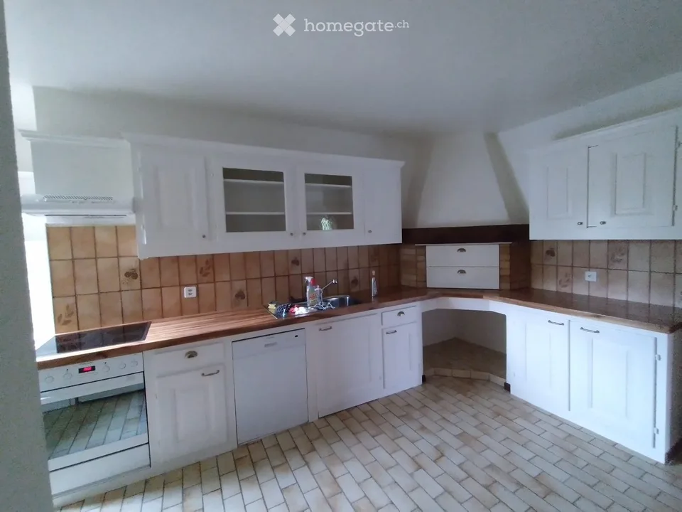 Grande duplex con fascino in una vecchia fattoria ristrutturata