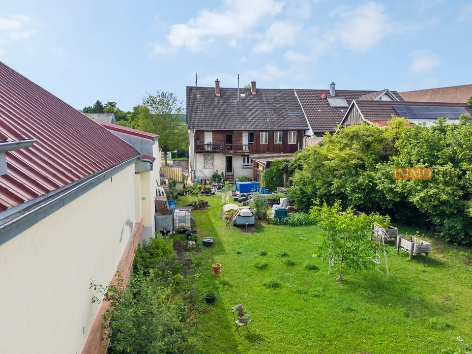 IMMORath.de  Zweifamilienhaus mit Ausbaupotential und großzügige Gart
