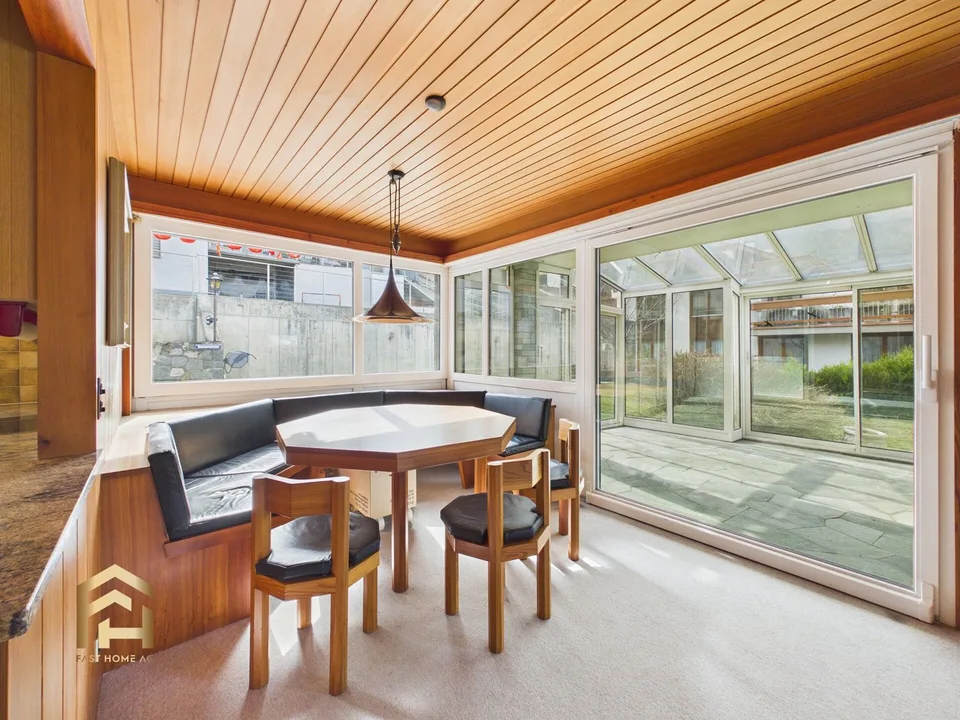 Casa familiare affascinante con giardino invernale e ampio ambiente