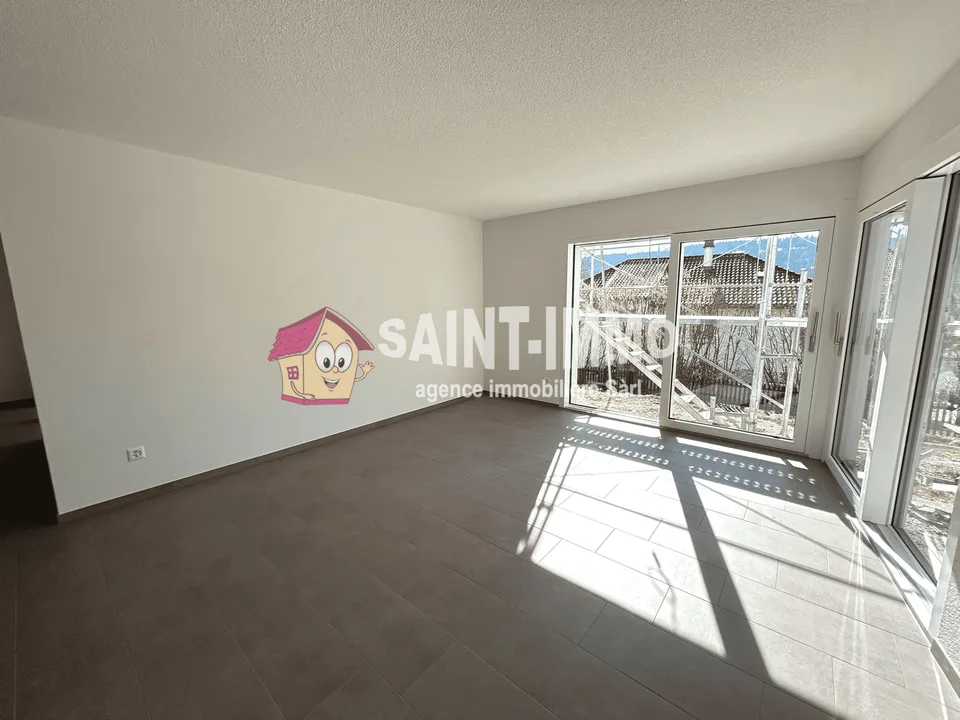 Appartement neuf de 4.5 pièces (104 m2) avec terrasse / jardin privatif et couvert pour voiture