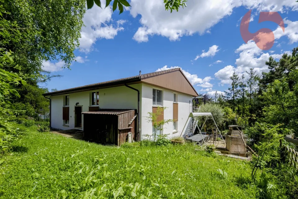 Einfamilienhaus mit Mieteinnahmen, nur wenige Schritte vom See entfernt