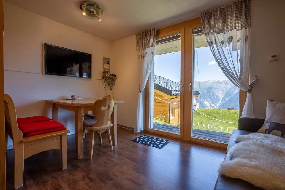 Appartamento di 2,5 locali stiloso con terrazza soleggiata nel cuore di Bettmeralp