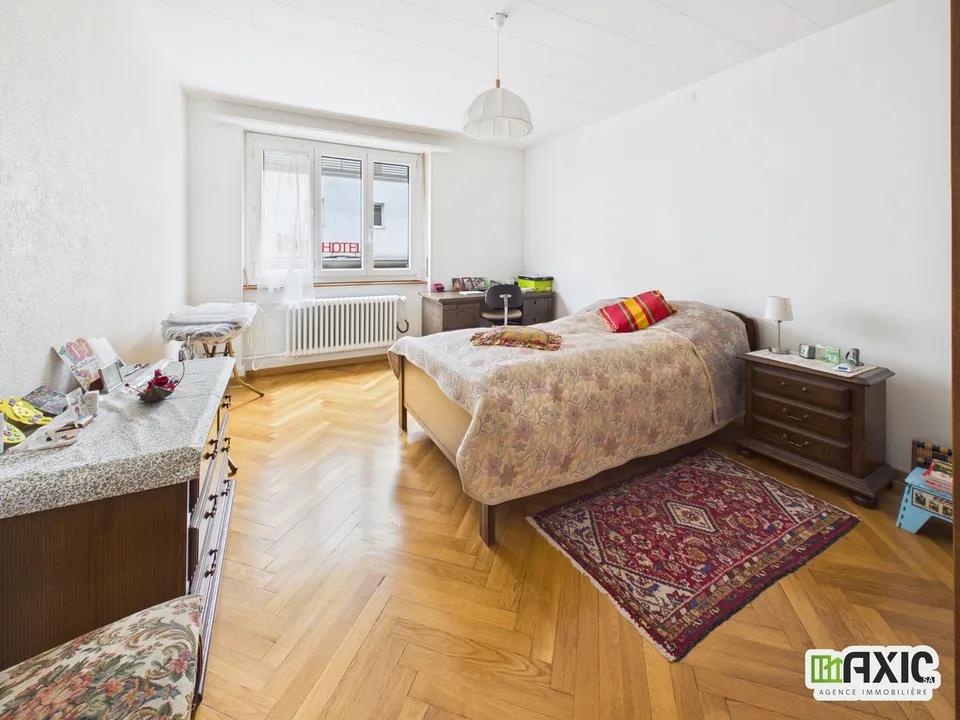 À vendre à Delémont : immeuble mixte comprenant 6 logements et 1 commerce – Foto 9 von 13