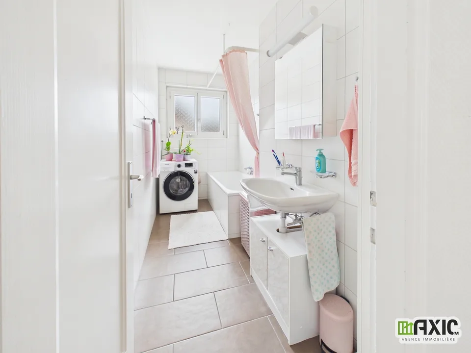À vendre à Delémont : immeuble mixte comprenant 6 logements et 1 commerce – Foto 6 von 13