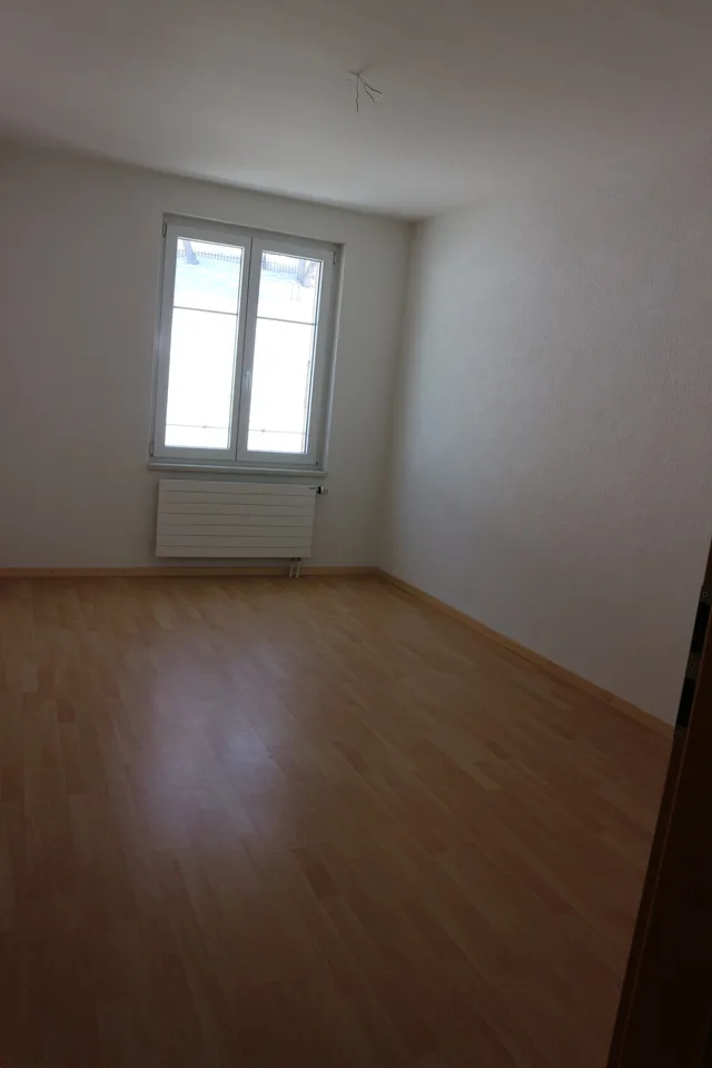 4  pièces dans petit immeuble locatif