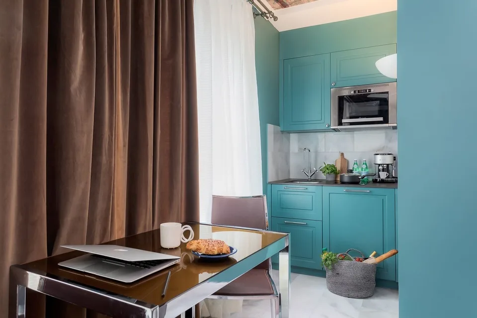 Studio Junior, Cucinetta - Appartamento arredato con pulizia settimanale inclusa