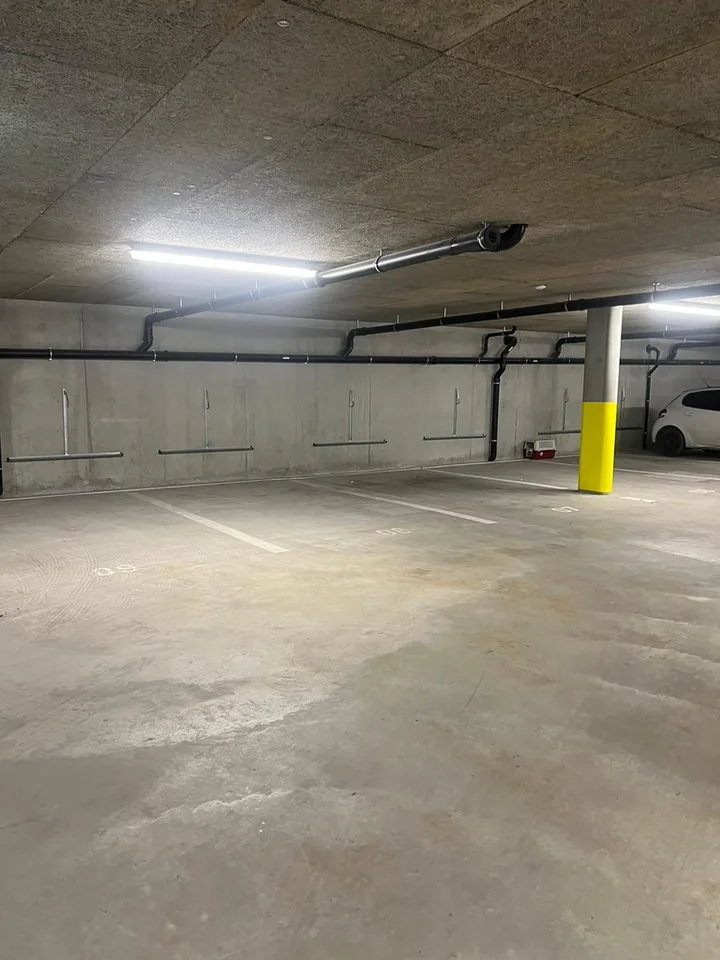 Tiefgaragenparkplatz in Aigle zu vermieten