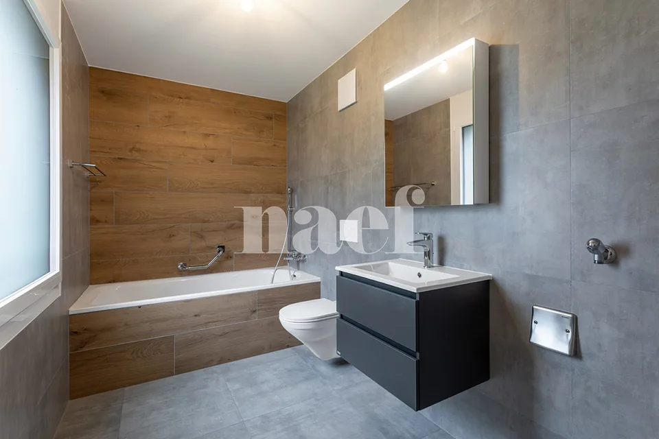 Magnifico appartamento di 5.5 locali nel sottotetto con loggia in vendita a St-Aubin