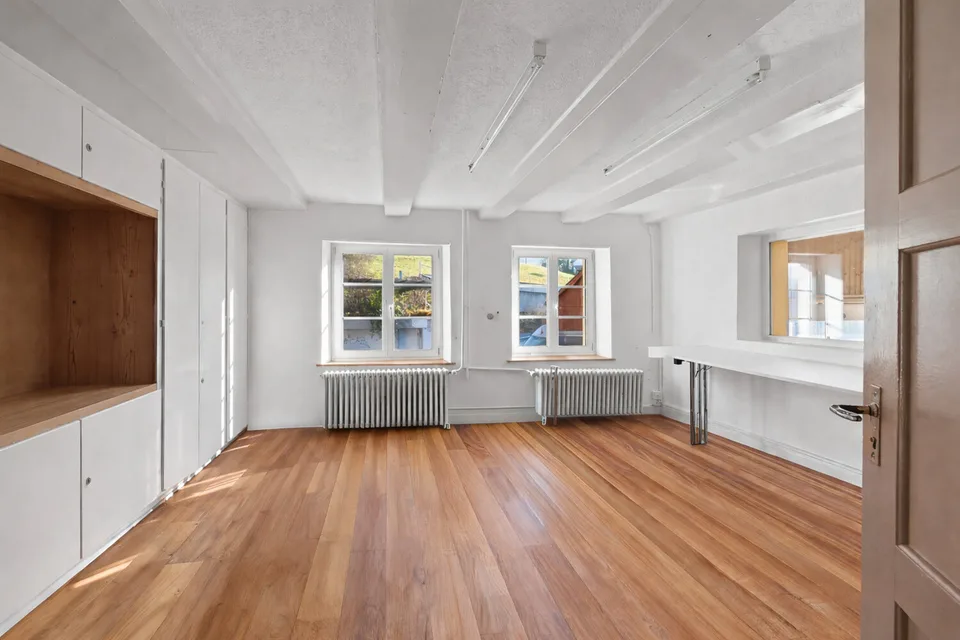 Wohn- und Geschäftshaus mit Entwicklungspotenzial an zentraler Lage in – Foto 9 von 13