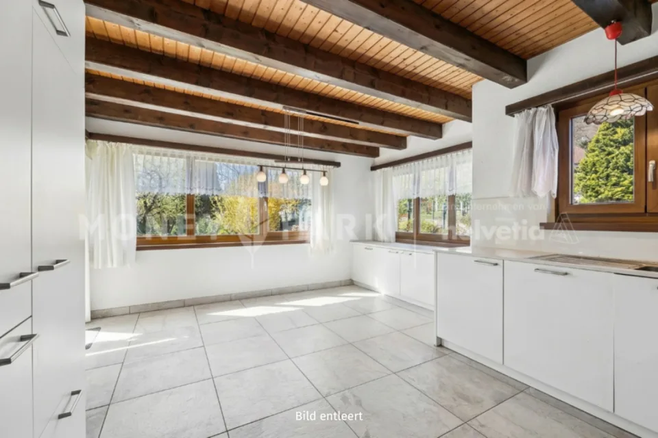 Attraente casa unifamiliare di 5,5 locali con terrazza e balcone