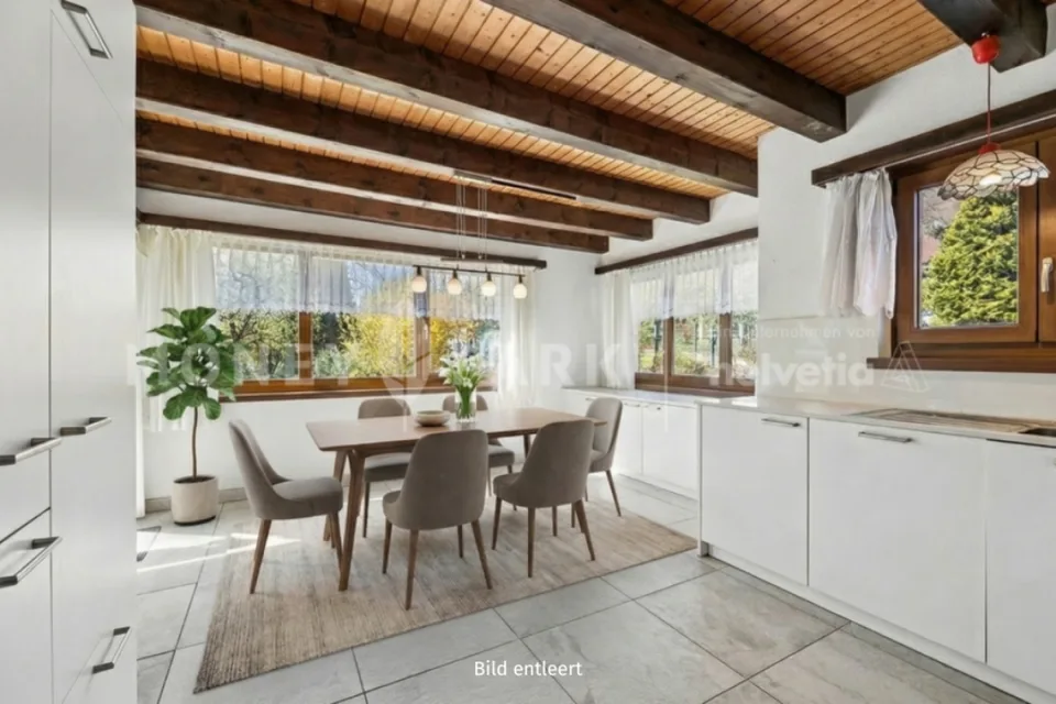 Attraente casa unifamiliare di 5,5 locali con terrazza e balcone