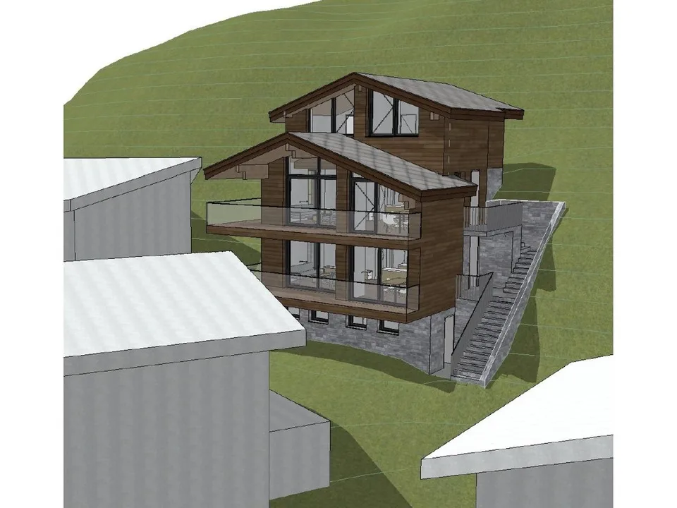 Parcelle de construction ensoleillée avec vue sur les montagnes à Zermatt