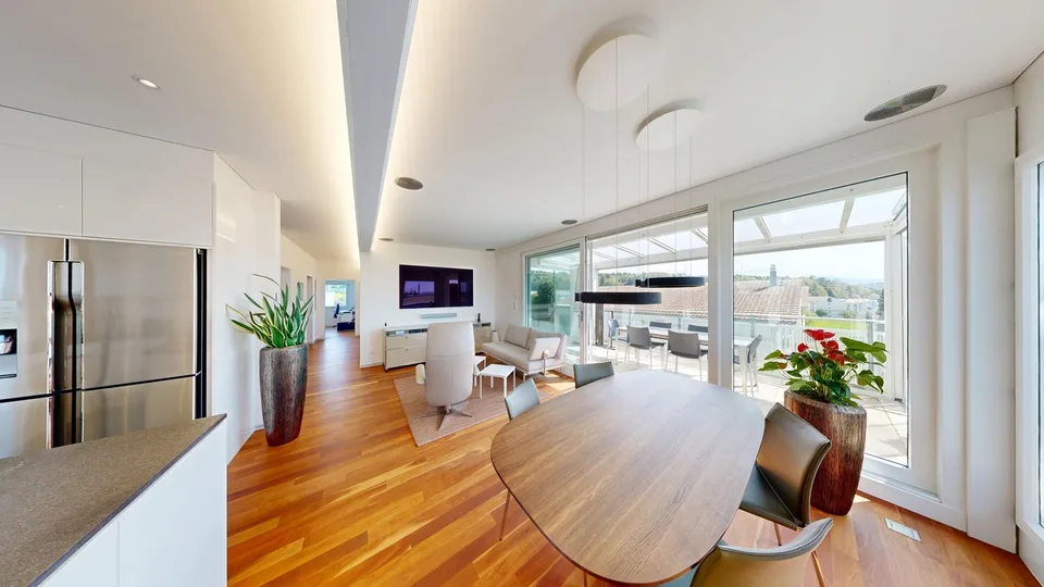 Exklusive Attikawohnung mit 54 m² Sonnenterrasse – 1 Einstellhallenplatz inklusive