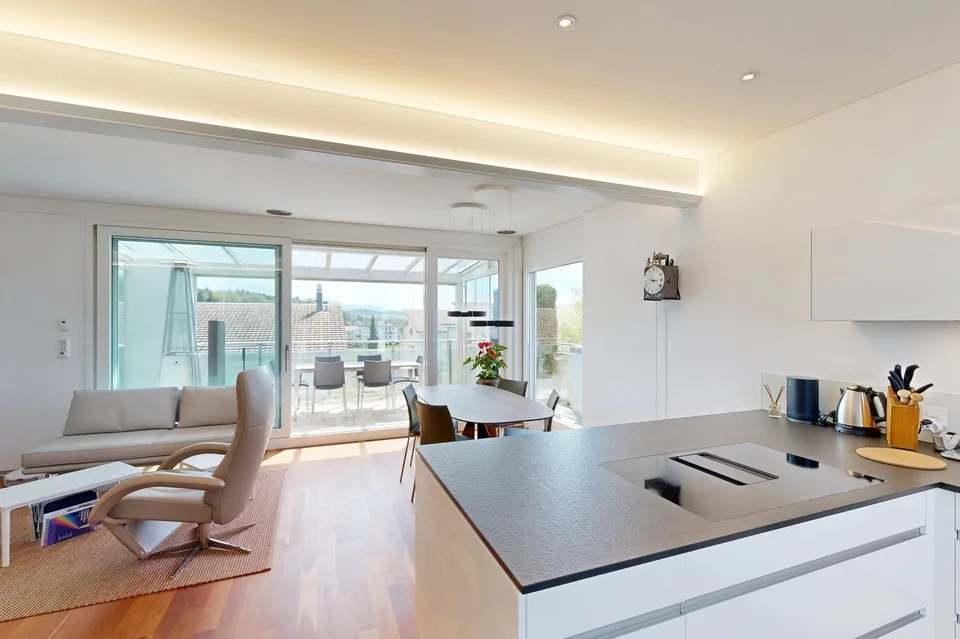 Exklusive Attikawohnung mit 54 m² Sonnenterrasse – 1 Einstellhallenplatz inklusive