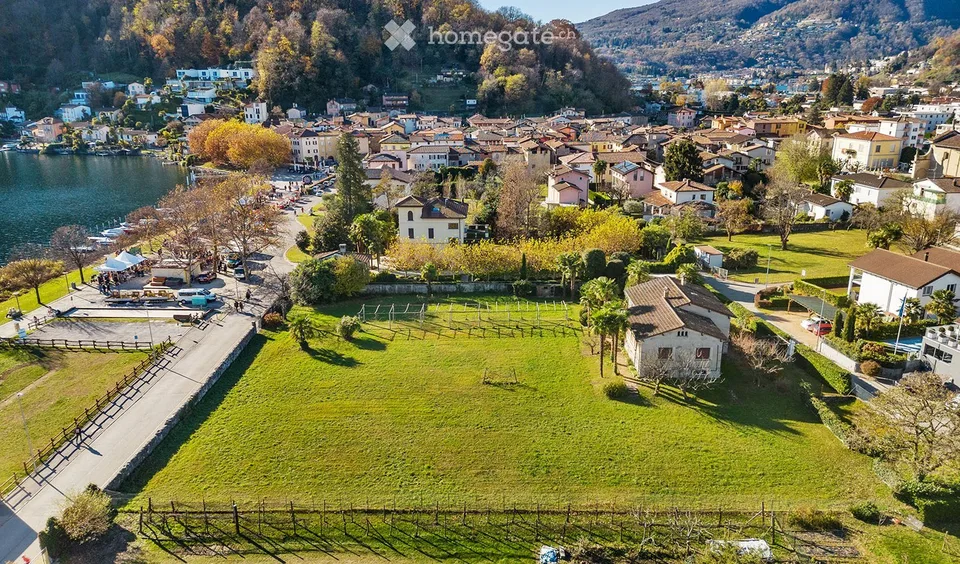 Terrain à bâtir attractif à Caslano – situation de rêve au bord du lac avec une vue magnifique