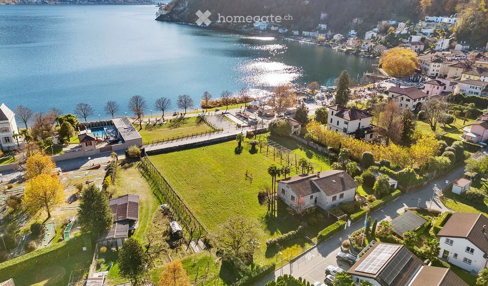 Terrain à bâtir attractif à Caslano – situation de rêve au bord du lac avec une vue magnifique
