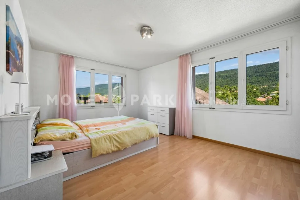 APPARTEMENT FAMILIAL LUMINEUX DE 4.5 PIECES AVEC VÉRANDA ET JARDIN PRIVATIF