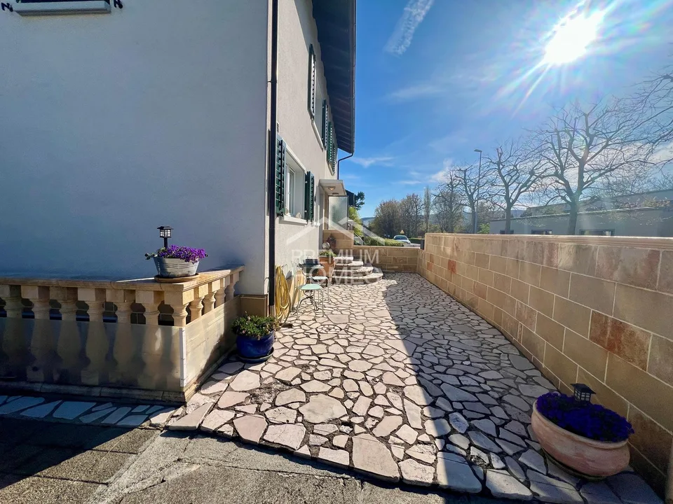 Maison charmante avec jardin ensoleillé et potentiel d'agrandissement