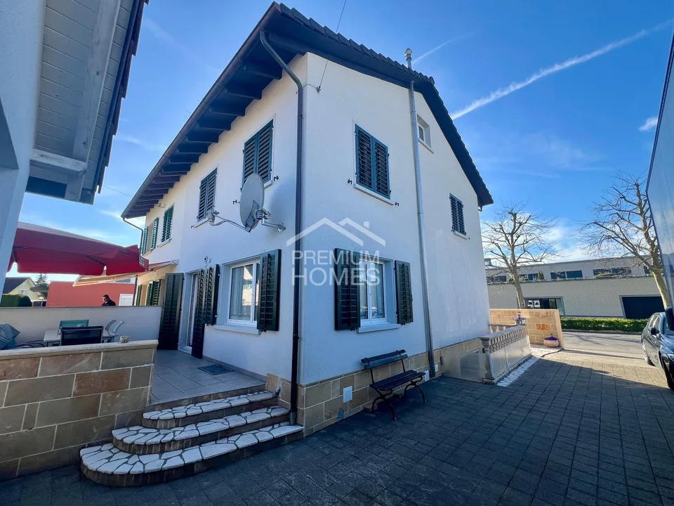 Maison charmante avec jardin ensoleillé et potentiel d'agrandissement
