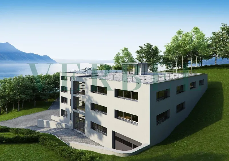Terrain avec permis en force pour immeuble multifonctionnel