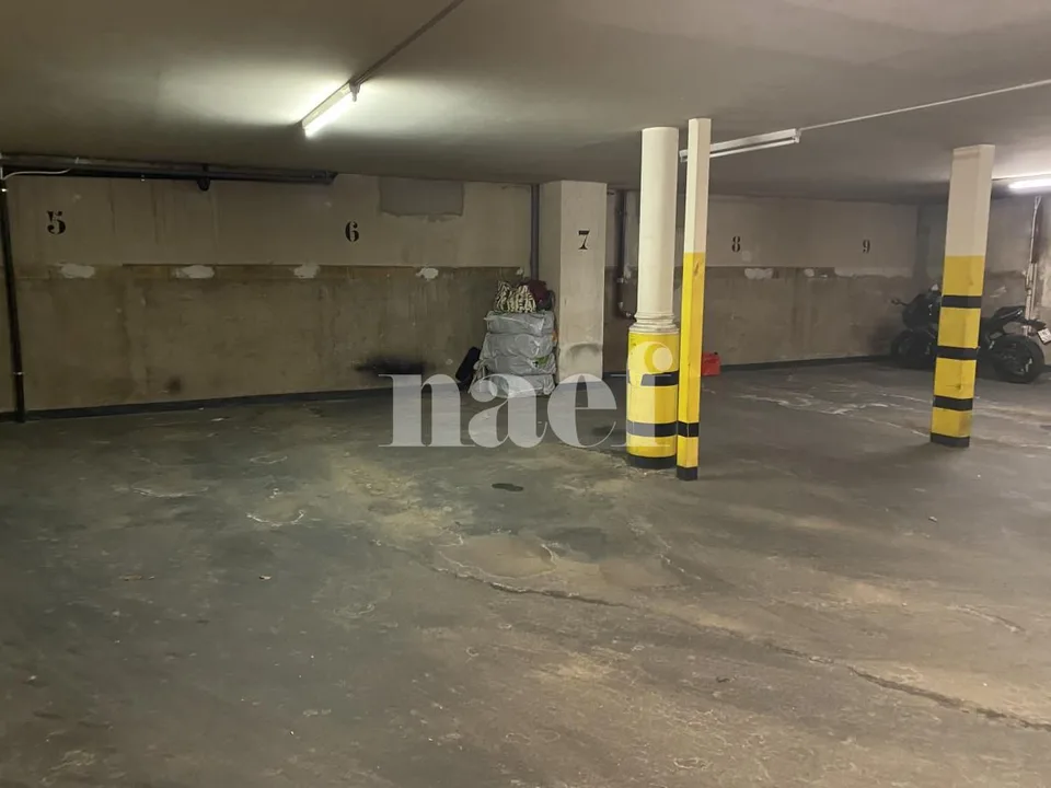 Place de parc dans garage collectif