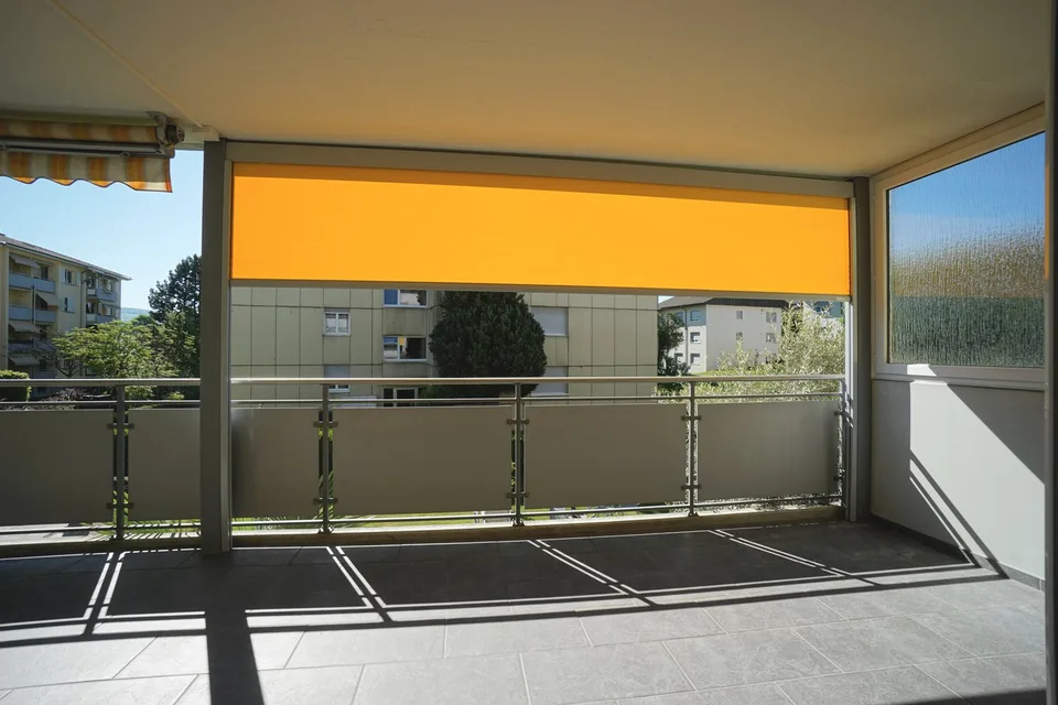 Bel appartement 5.5 pièces au 1er étage avec balcon, local de cave et deux places de parking – photo 13 sur 14