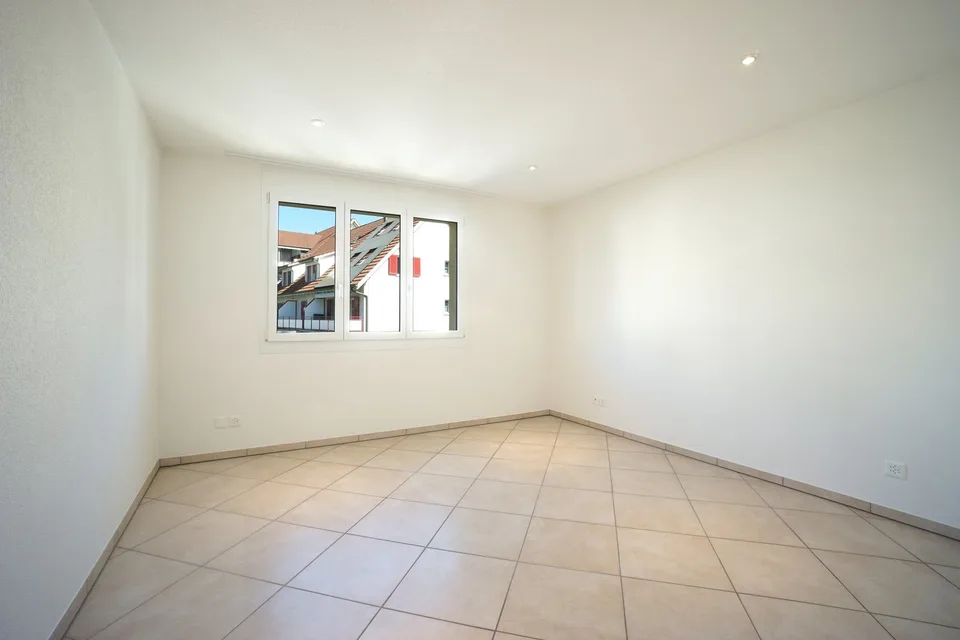 Bel appartement 5.5 pièces au 1er étage avec balcon, local de cave et deux places de parking – photo 7 sur 14