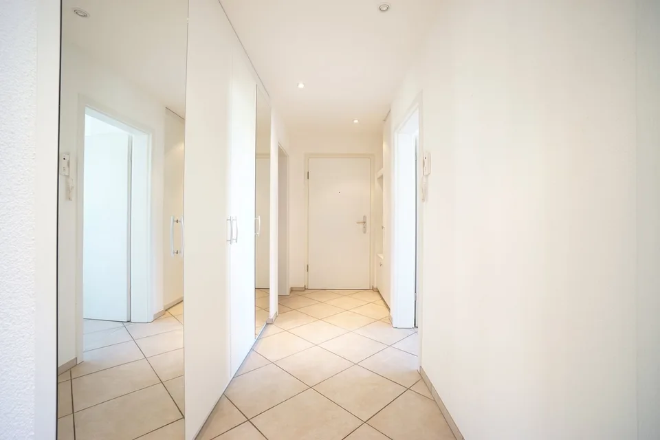 Bel appartement 5.5 pièces au 1er étage avec balcon, local de cave et deux places de parking – photo 9 sur 14