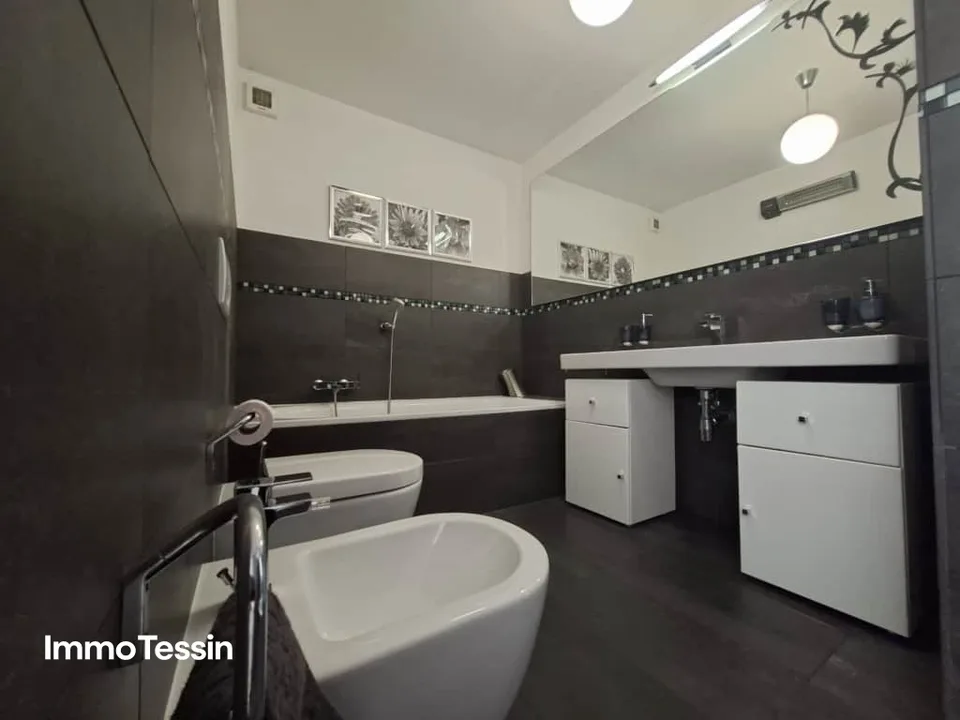Maison élégante avec vue lacustre à 180 degrés sur le Lago di Lugano dans un emplacement magnifique avec jardin et plusieurs options de stationnement – photo 13 sur 13