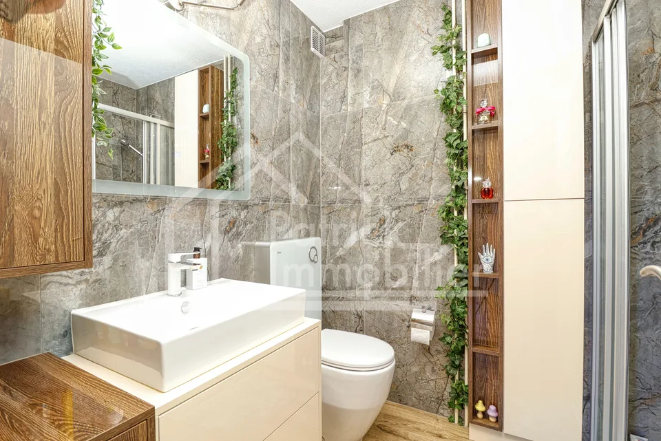 Charmant appartement de 2.5 pièces au 1er étage avec balcon