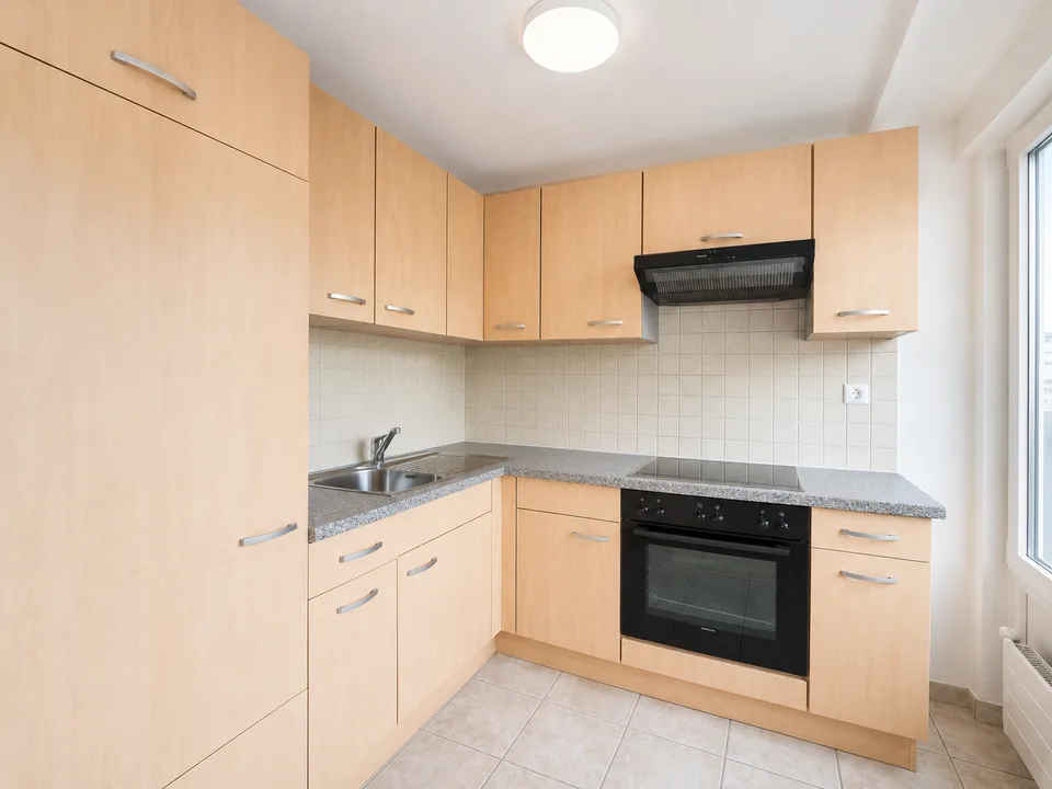 Appartement 2.5 pièces avec balcon et belle vue au 5ème étage – Le Locle