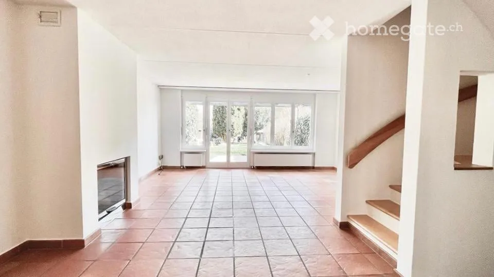Casa a schiera familiare con potenziale di spazio eccezionale