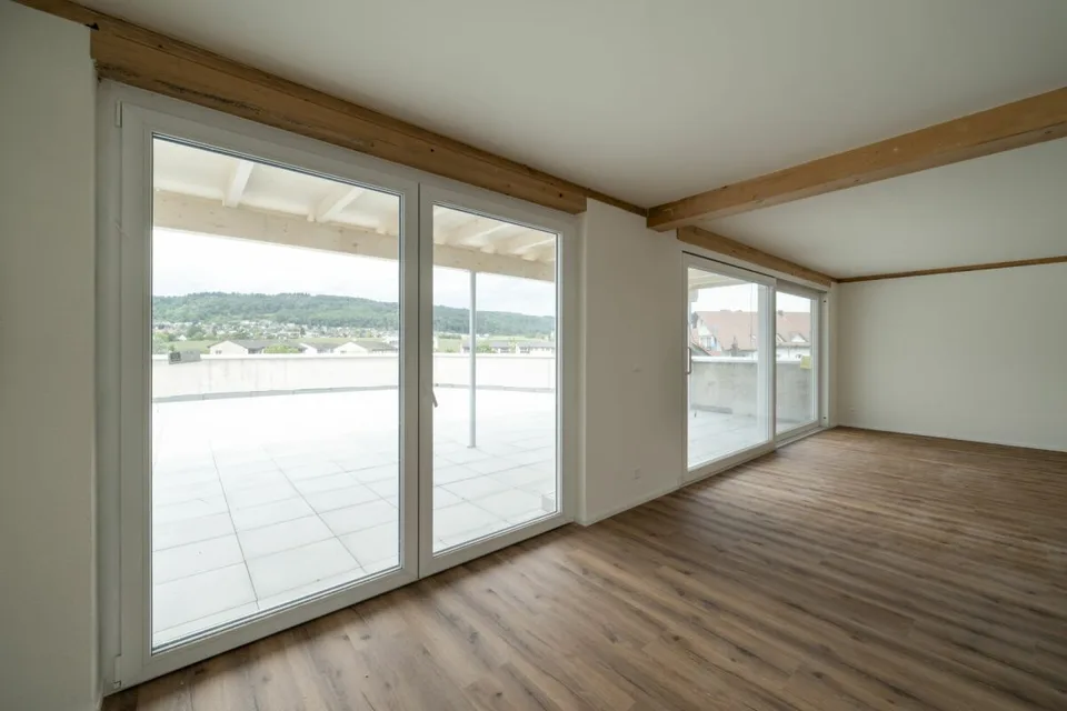 Exklusive 4.5-Zimmer-Attikawohnung mit ca. 163 m² Sonnenterrasse - Erstbezug im Neubau
