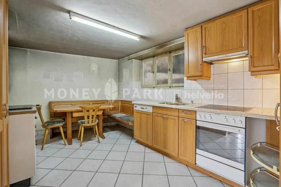 Maison mitoyenne de 5,5 pièces avec potentiel de développement