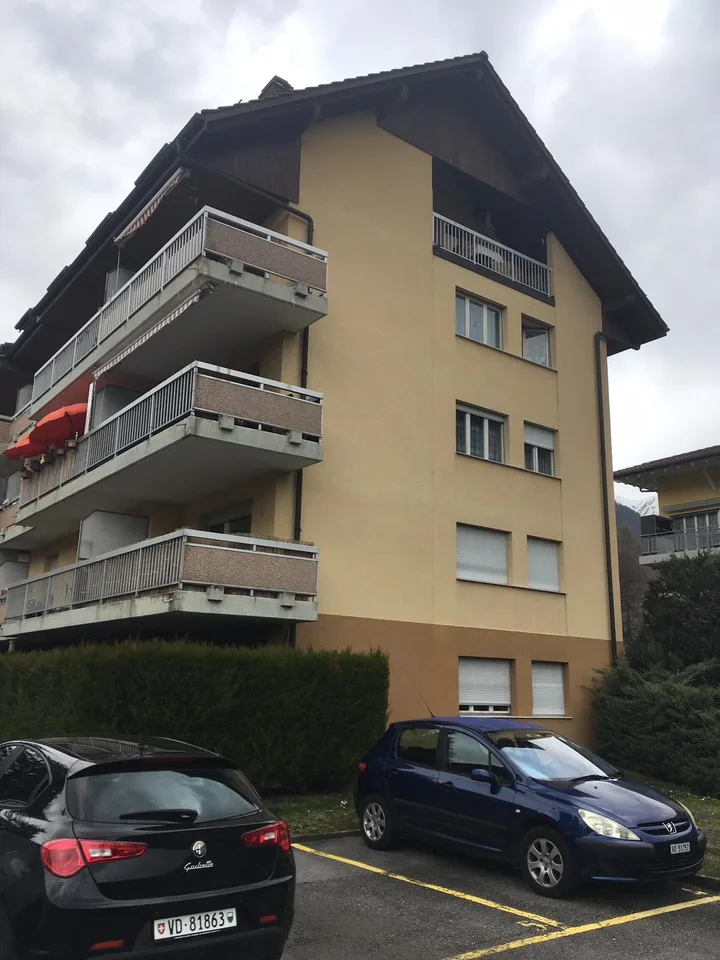 Place de parc proche du centre ville