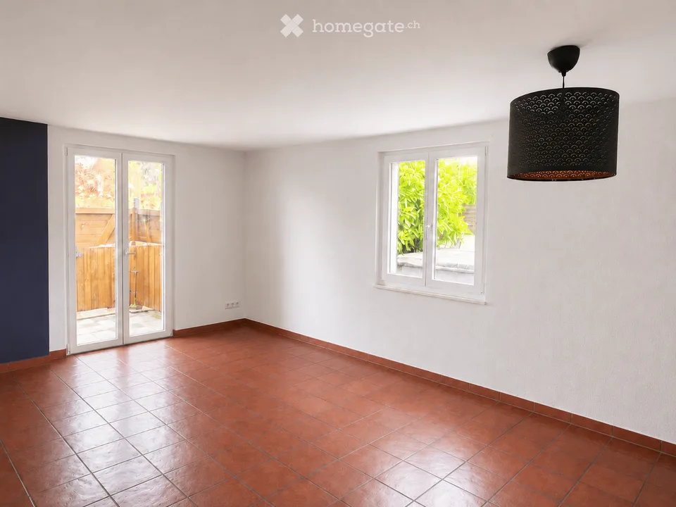 Casa unifamiliare di 5,5 locali con giardino, balcone, garage e parcheggi esterni