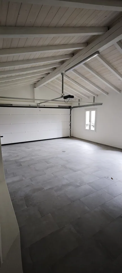 4 Zimmer in einem vollständig renovierten Doppelhaus in Monte Carasso