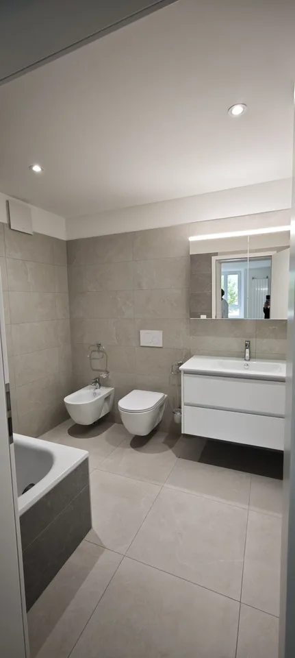 4 Zimmer in einem vollständig renovierten Doppelhaus in Monte Carasso – Foto 13 von 15