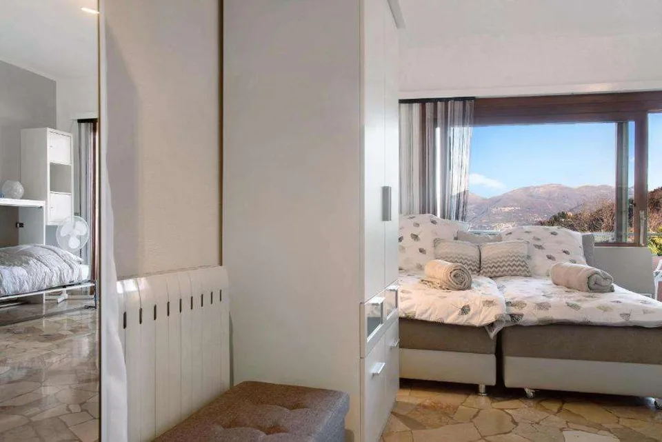 Curato studio d'angolo sito all'ultimo piano con incantevole vista lag – foto 6 di 13
