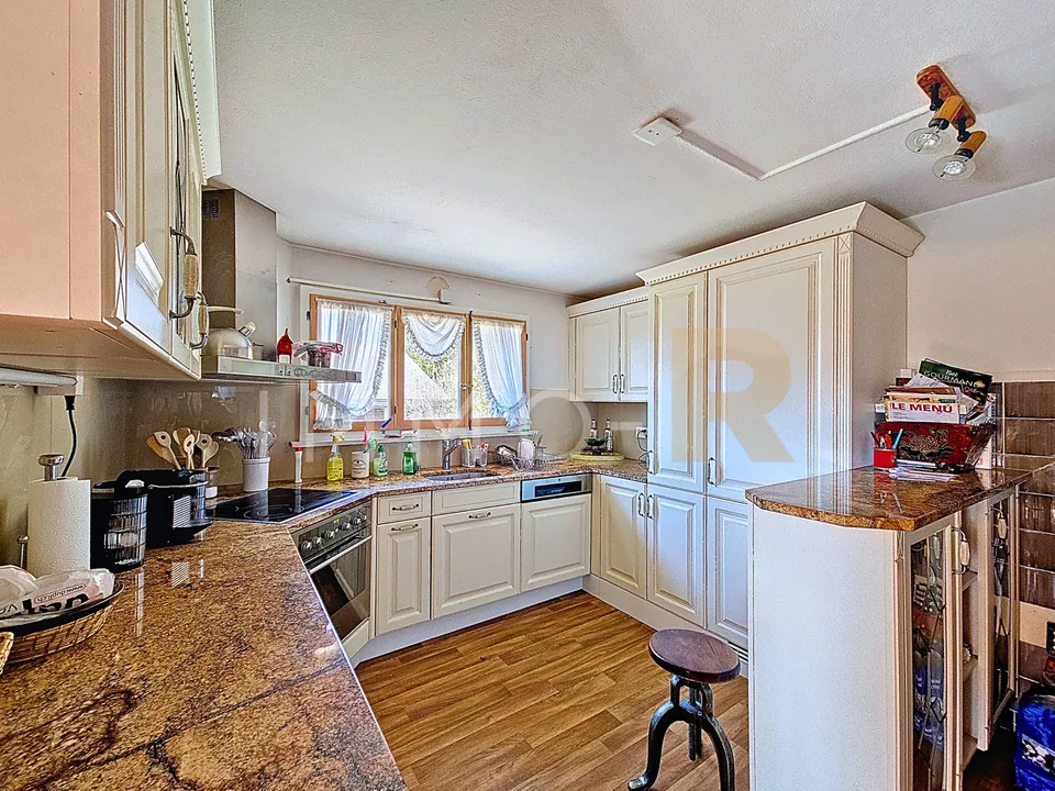 Appartamento di 5,5 locali affascinante in un chalet – foto 6 di 11