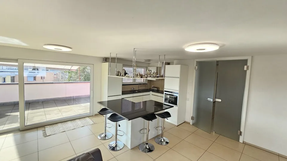 Vivre au sommet : attique de 140 m² avec terrasse de 128 m²