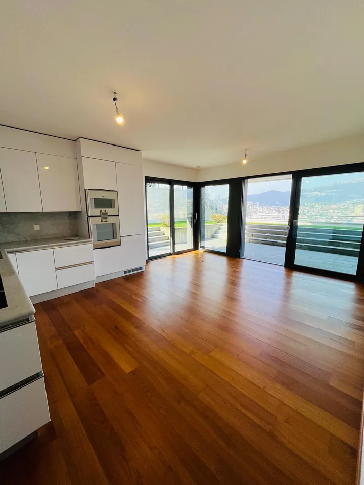 Appartement de 3,5 pièces avec jardin et vue sur le lac