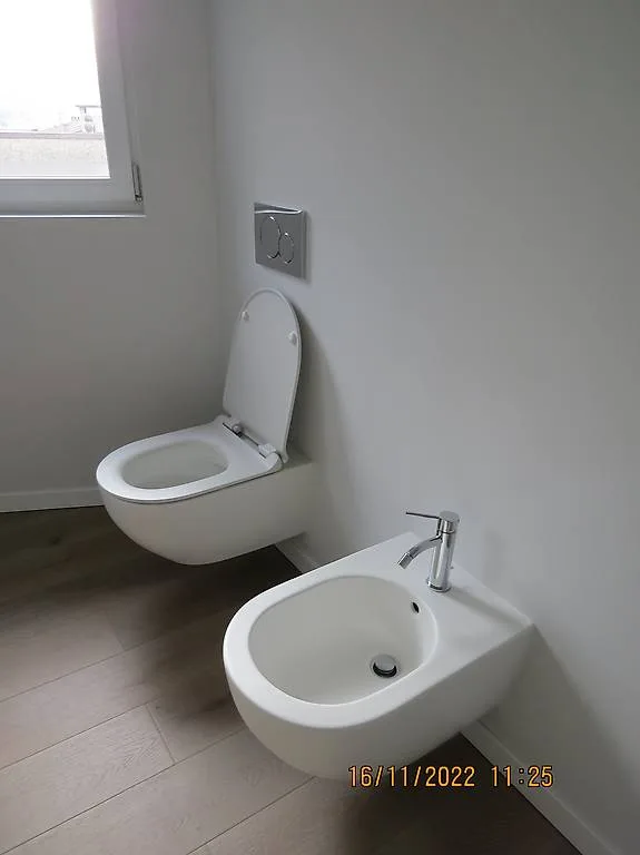 Modern 4-room apartment in Melano – New building with balcony and view – photo 8 of 10