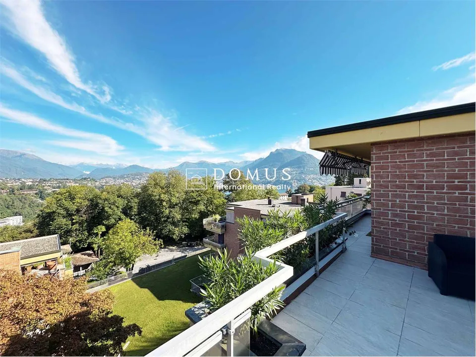 Dachgeschoss mit Seeblick-Terrasse in Pazzallo