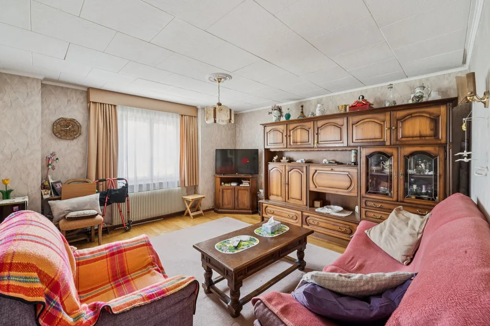 Maison villageoise de 6 appartements et 10 places de parc avec grange