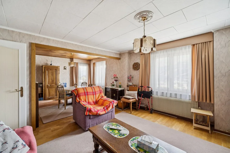 Maison villageoise de 6 appartements et 10 places de parc avec grange