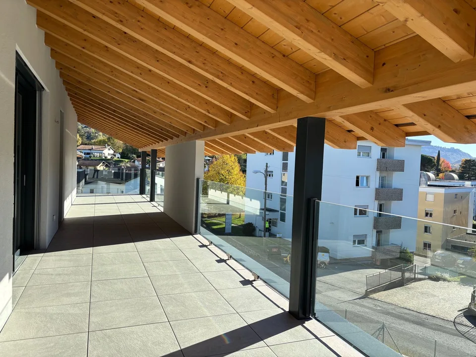 Moderno attico  di 3.5 locali con  ampio terrazzo