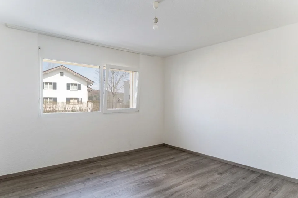 Appartement de 4.5 pces au rez-de-chaussée EST avec jardin