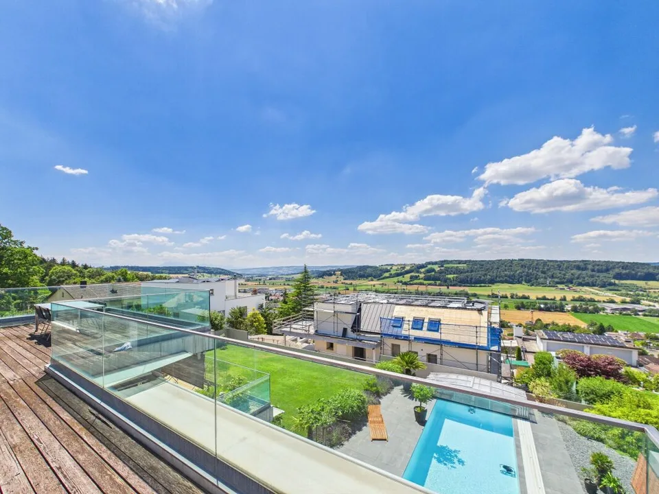 Exklusive 6.5-Zimmer-Maisonette-Terrassenwohnung mit Alpenpanorama & 75 m² Sonnenterrasse